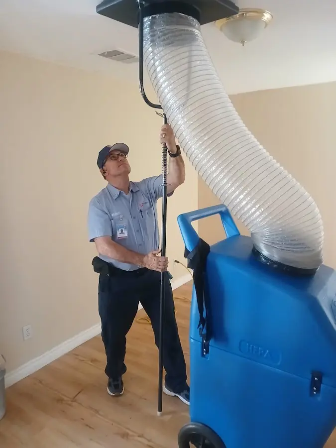 Mini Split Installation technician using HEPA equipment in Vero Lake Estates